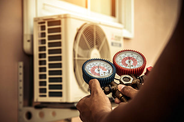 Professional Hvac Repair technician working in Reading, MA